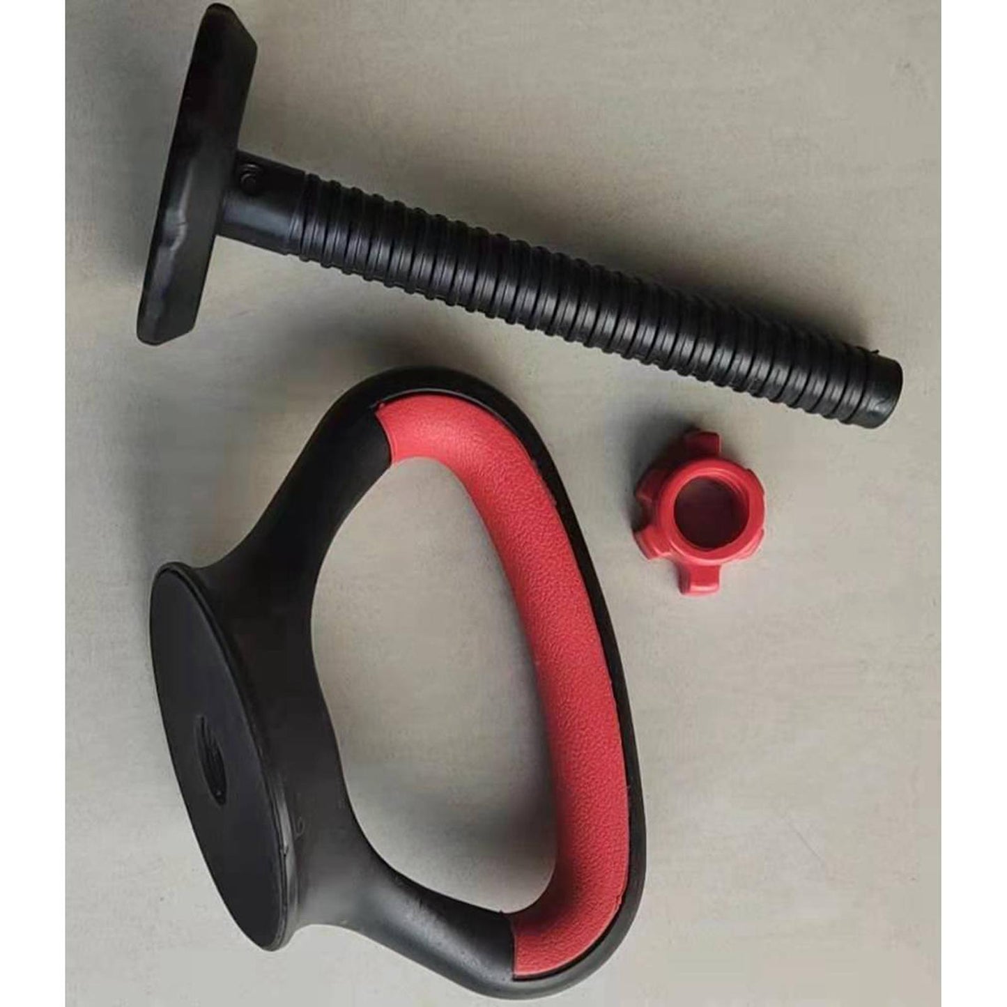 Image of three components for the JB Muscle™ Adjustable Kettlebell Handle: Dynamic Arm Strength Training by JB Muscle: a black and red handle, a ribbed black rod with a flat end, and a red plastic screw cap. Perfect for fitness enthusiasts looking to enhance their arm strength training.