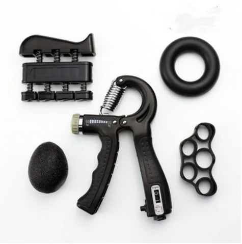 A set of tools, including a hammer, a pair of knuckles, and a JB Muscle™ Hand Gripper: Dynamic Arm Strength Trainer.