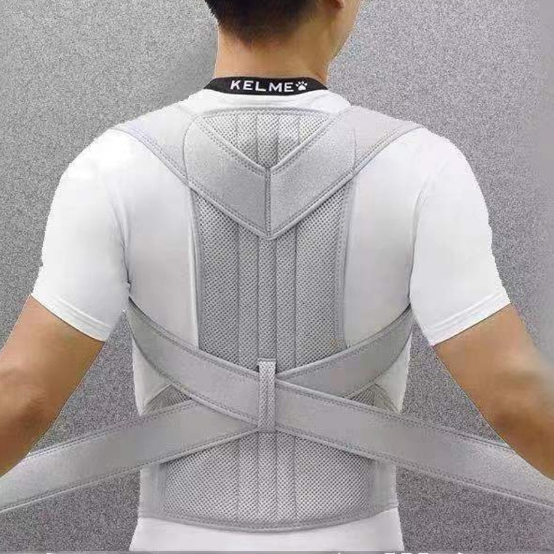 The back of a man wearing a JB Muscle™ Adjustable Posture Corrector Brace | Back Support Harness.