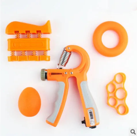 A set of orange tools and a JB Muscle™ Hand Gripper: Dynamic Arm Strength Trainer.
