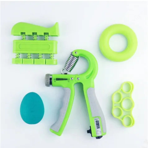 A set of tools, including a JB Muscle™ Hand Gripper and a pair of scissors, designed to improve grip strength.