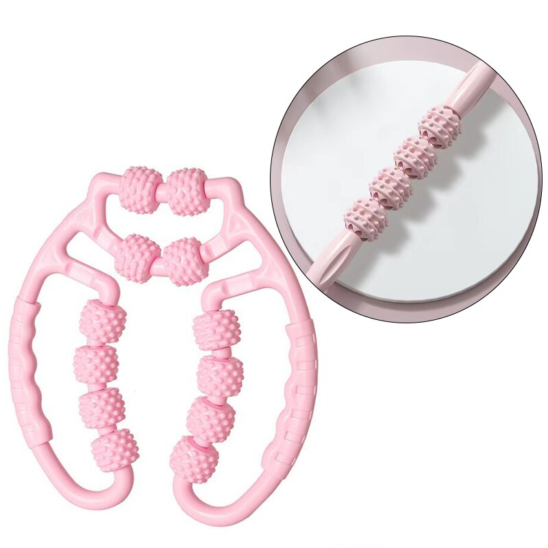 A JB Muscle pink baby teething ring with a pink bead on it.