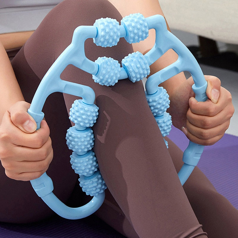 A woman practicing yoga with the JB Muscle™ Leg Clamp Massager: Relaxing Roller for Yoga  | Body Massager to elevate her practice.