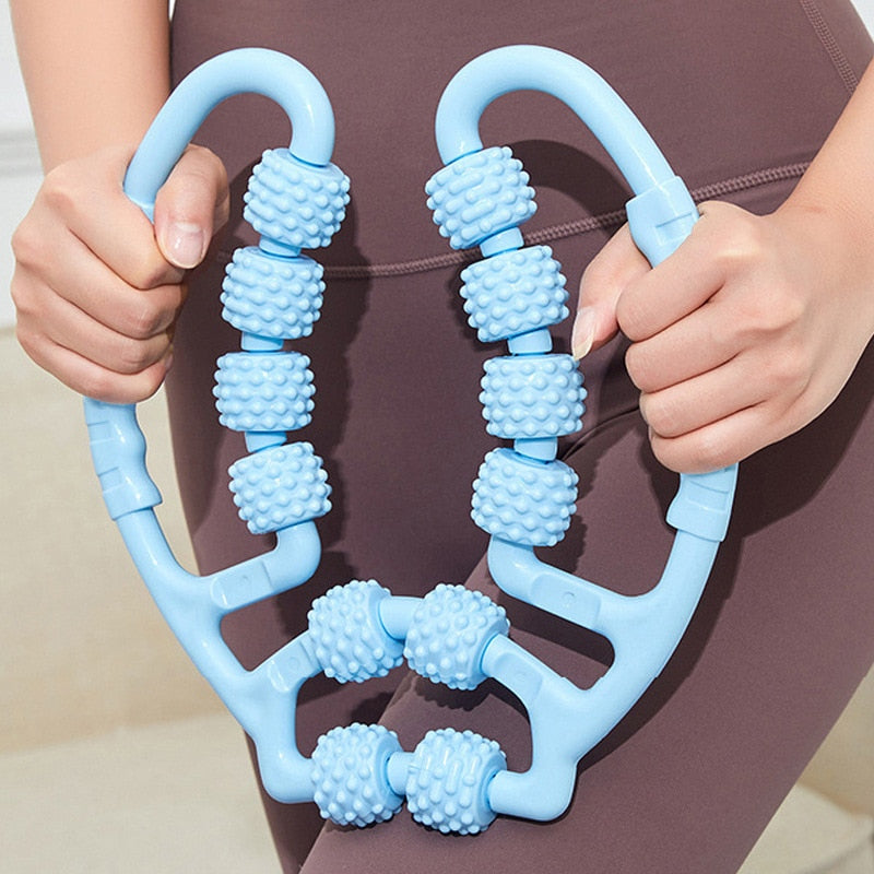 A woman holding a JB Muscle™ Leg Clamp Massager: Relaxing Roller for Yoga  | Body Massager.